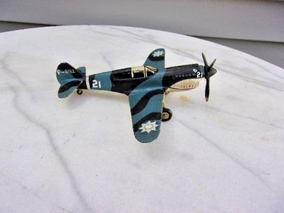 Avión de combate Hubley P-40 Warhawk de hierro fundido de colección Segunda Guerra Mundial.  Tigres voladores.  Foto 1 de 4