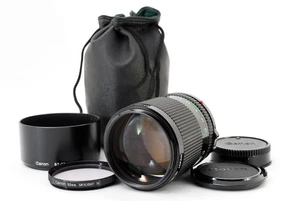 Obiettivo Manuale Canon Nuovo FD NFD 100mm F/2 Con Paraluce Da GIAPPONE - Foto 1 di 12
