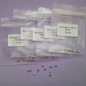 100 Paquetes Ortodoncia Dental Gancho Prenzable Topes Tipo Split Acero Inoxidable NUEVO - Imagen 1 de 7