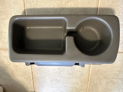 Ford F150 F250 1994-1996 Bronco asiento de banco piso portavasos almacenamiento gris OEM Foto 1 de 4