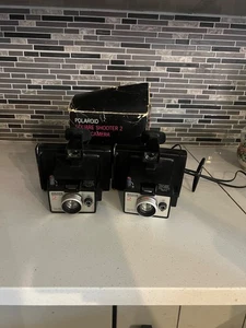 Vintage 2er Set Polaroid Square Shooter 2 mit Handbuch und Koffer [ungetestet] - Bild 1 von 3