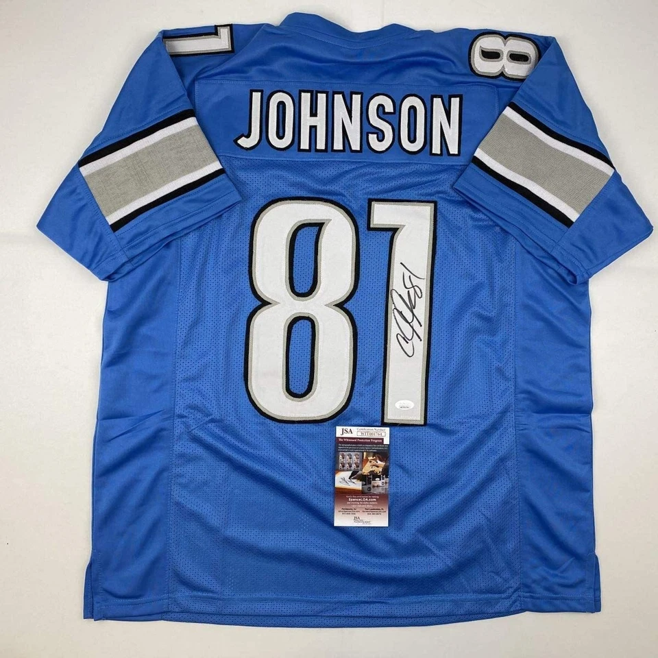 Camiseta de fútbol americano autografiada/firmada Calvin Johnson azul Detroit certificado de autenticidad JSA Foto 1 de 4