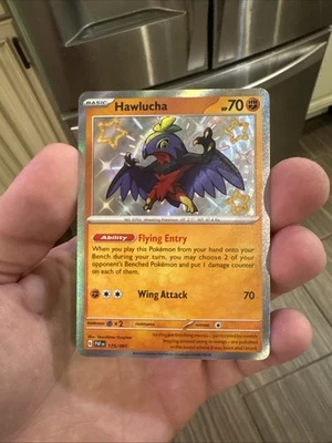 Hawlucha 175/091 SV: Paldean Fates Holo - Image 1 of 2