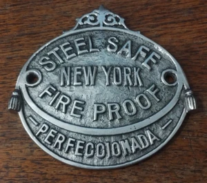 ANTIGUO LETRERO PERFECCIONADO PLACA SÓLIDA ACERO SEGURO NUEVA YORK A PRUEBA DE FUEGO MUY RARO - Imagen 1 de 4