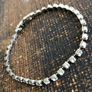 VTG RHINESTONE TENNIS BRACELET LIGHTWEIGHT GOLDTONE 7" 1/8" STONES GUC - Picture 1 of 3