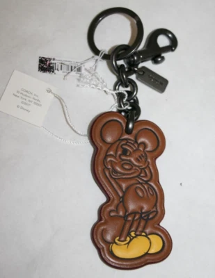 COACH Disney Tímido Mickey Mouse Llavero Monedero Dije F59866 Marrón/Amarillo RARO NUEVO Foto 1 de 4