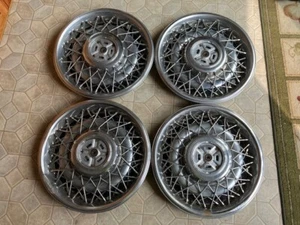 1986-1992 Cadillac Fleetwood Brougham Wire Spoke Hubcaps - Picture 1 of 1