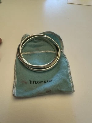 PLATA ESTERLINA .925 TIFFANY & CO. DE COLECCIÓN PULSERA BRAZALETE TRIPLE ROLLING INTERLOCK Foto 1 de 4