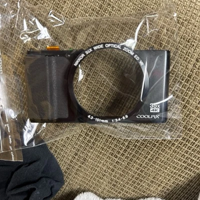 PEÇA DE CAPA FRONTAL GENUÍNA NIKON COOLPIX A900 PARA REPARO - Imagem 1 de 2