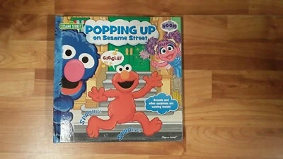 Sesame street popping up on sesame street poo-up hardcover childrens book - Image 1 of 3