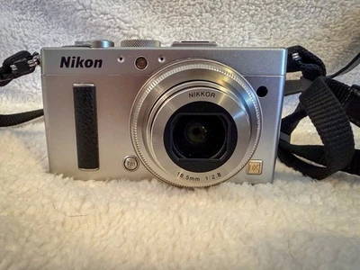 [EXCELLENT] Nikon COOLPIX A Silver 16.2MP Camera– DX APS-C Sensor – 18.5mm f/2.8 - Image 1 of 4
