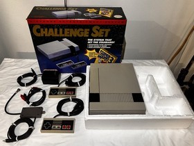 Nintendo NES Challenge Set Console With 12 Games And Cleaning Kit.