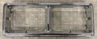 USED 1980-1989 Dodge Diplomat Salon and Plymouth Gran Fury Headlight Door  - Image 1 of 3