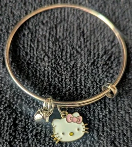Bracciale Hello Kitty in argento a tema con ciondolo e campanella. - Foto 1 di 5