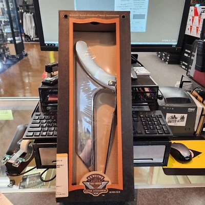 60413-04  Harley Davidson Genuine NOS Chrome Lower Belt Guard - Image 1 of 4