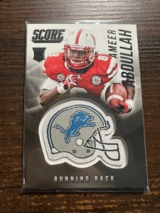 A128,719 - 2015 Score Rookie Helmets #10 Ameer Abdullah