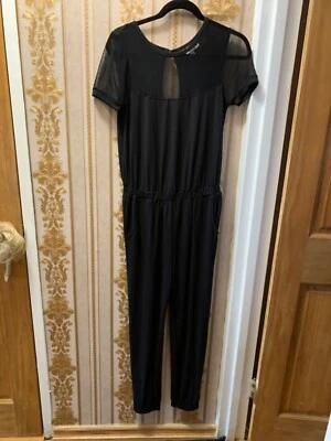 ¡NUEVO CON ETIQUETAS! MONO DERECHO CORAZÓN NEGRO TALLA MEDIANA, HECHO EN ITALIA  Foto 1 de 4