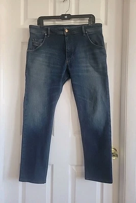 Pantalones de mezclilla DIESEL KROOLEY-T elásticos cónicos 084 años azul para hombre 34 Rodeo Foto 1 de 4