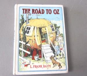 1909 THE ROAD TO OZ BY L. FRANK BAUM AND ILLUSTRATED BY JOHN NEILL (HARDBACK) - Foto 1 di 8