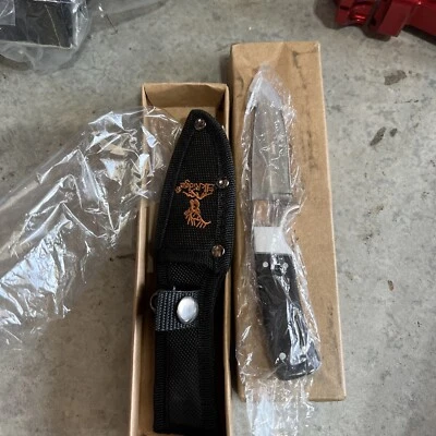 Cuchillo de Caza Elk Ridge 3.1" Hoja Plateada Gancho Intestino Madera Negra Perla Mango Blanco Foto 1 de 4