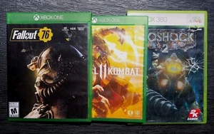 (3) VIDEO GAMES BIOSHOCK 2 MORTAL KOMBAT 11 FALLOUT 76 XBOX TESTED AND WORKS - Picture 1 of 2