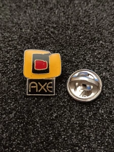 Pin's Pins Pin Enamel 62 Société Hygiène Déodorant "AXE" - Picture 1 of 2