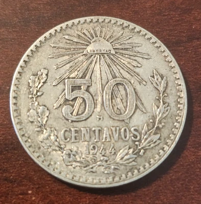 Moneda de 50 centavos de México 1944 - KM# 447 - plata .720 - buen tono Foto 1 de 2