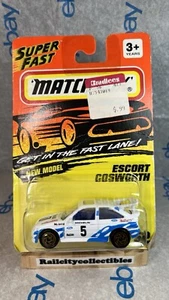 NUOVO 1994 MATCHBOX SUPERFAST ESCORT COSWORTH AUTO PRESSOFUSA #52 FORD - Foto 1 di 11