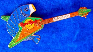 EMAILLE NAGOYA KINDERTAG KOI FISCH GIBSON FLIEGEN V GITARRE Hard Rock Cafe PIN - Bild 1 von 1