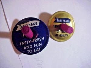 2 TASTYKAKE Vintage TIN ADVERTISING Spinning TOPS one is 1914 - 1964 50 Years - Picture 1 of 3