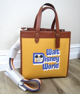 ¡NUEVO BOLSO DE MANO DE CAMPO DE CUERO DISNEY WORLD PARKS COACH BOLSO MICKEY 50! Foto 1 de 4