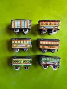 Six, 1930s - 1950s Penny Toy Railroad Cars - Picture 1 of 3