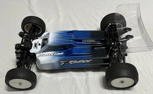 1/10 Scale 4WD Radio Control Buggy Xray XB4 with electronics - Picture 1 of 17