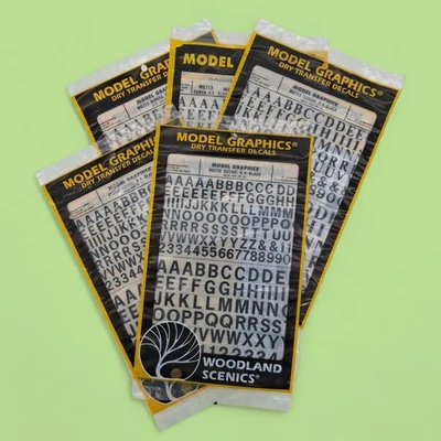 Lot of 5 Woodland Scenics MG732 & MG713 RR Dry Transfer Decals - Black - Image 1 of 3