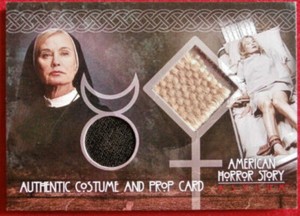 AMERICAN HORROR STORY - ASYLUM COSTUME & LEG RESTRAINT PROP CARD - JESSICA LANGE