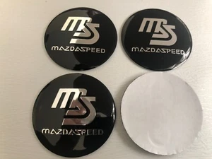 4x MazdaSpeed Mazda Speed Wheel Centre Cap Sticker 56mm Stickers Black / Silver - Picture 1 of 3