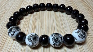 Black Floral Porcelain & Black Glass Beaded Stretch Bracelet - Picture 1 of 3
