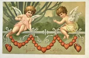 Postal de San Valentín en relieve Cupido querubín decoración con corazones - Imagen 1 de 2