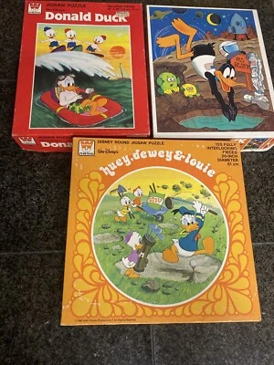 Lote de 3 rompecabezas vintage Whitman Disney Donald Duck Looney Tunes Pato Lucas Foto 1 de 4