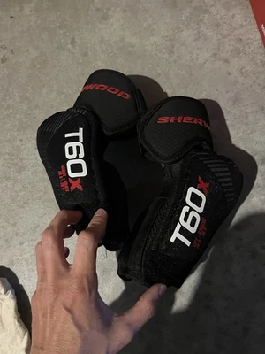 Almofadas de cotovelo de hóquei júnior Sherwood pequenas - Imagem 1 de 3