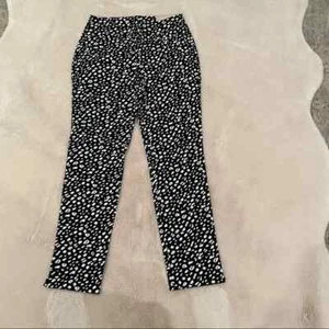 Pantalones elásticos ""tan adelgazantes"" Chico's 0R; US 4R negro/blanco leopardo - Imagen 1 de 5