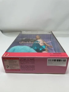 Armoire mode Barbie, mélanger et assortir pour créer 20 tenues différentes - Photo 1/7