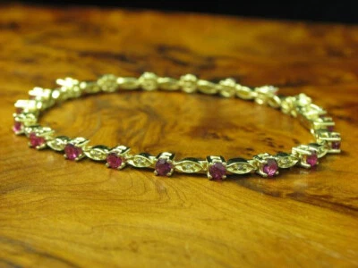 Yellow Gold Ruby Bracelet/14kt 585/0,095ct Diamond/3,0ct Ruby /11,4g /18cm - Image 1 of 4