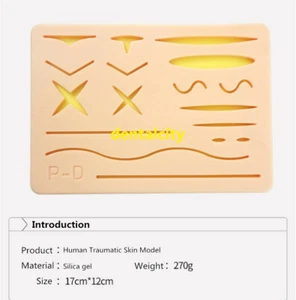 Almohadilla de sutura modelo de piel traumática humana kit de entrenamiento de sutura médica práctica nuevo - Imagen 1 de 6