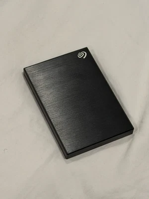 2TB SEAGATE BUCKUP PLUS SLIM P/N: 2R1APL-500 2TB - Image 1 of 3