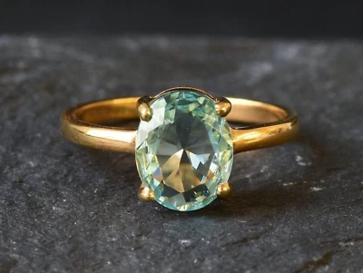 Anillo de compromiso ovalado de diamantes y aguamarina natural de 2,50 quilates de oro amarillo de 14 quilates talla 7 Foto 1 de 4