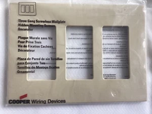 COOPER Wiring Devices 3 Gang Decorator Screwless Wallplate, Ivory - Picture 1 of 3