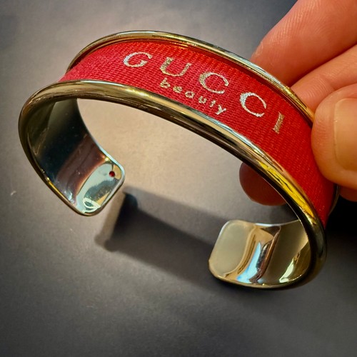 Bracciale Gucci in oro con nastro ciclato Up