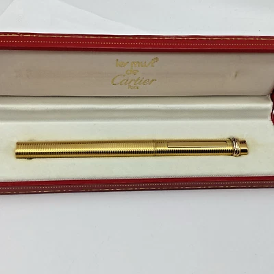 Auténtico bolígrafo Cartier Must de Cartier Trinity Vendome oro 3 anillos con caja Foto 1 de 4