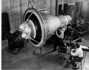 Engineers inspect and test a boilerplate Mercury space capsule Mercury Program - Picture 1 of 1